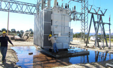 Damaged transformer emptied of cooling oil by shooting